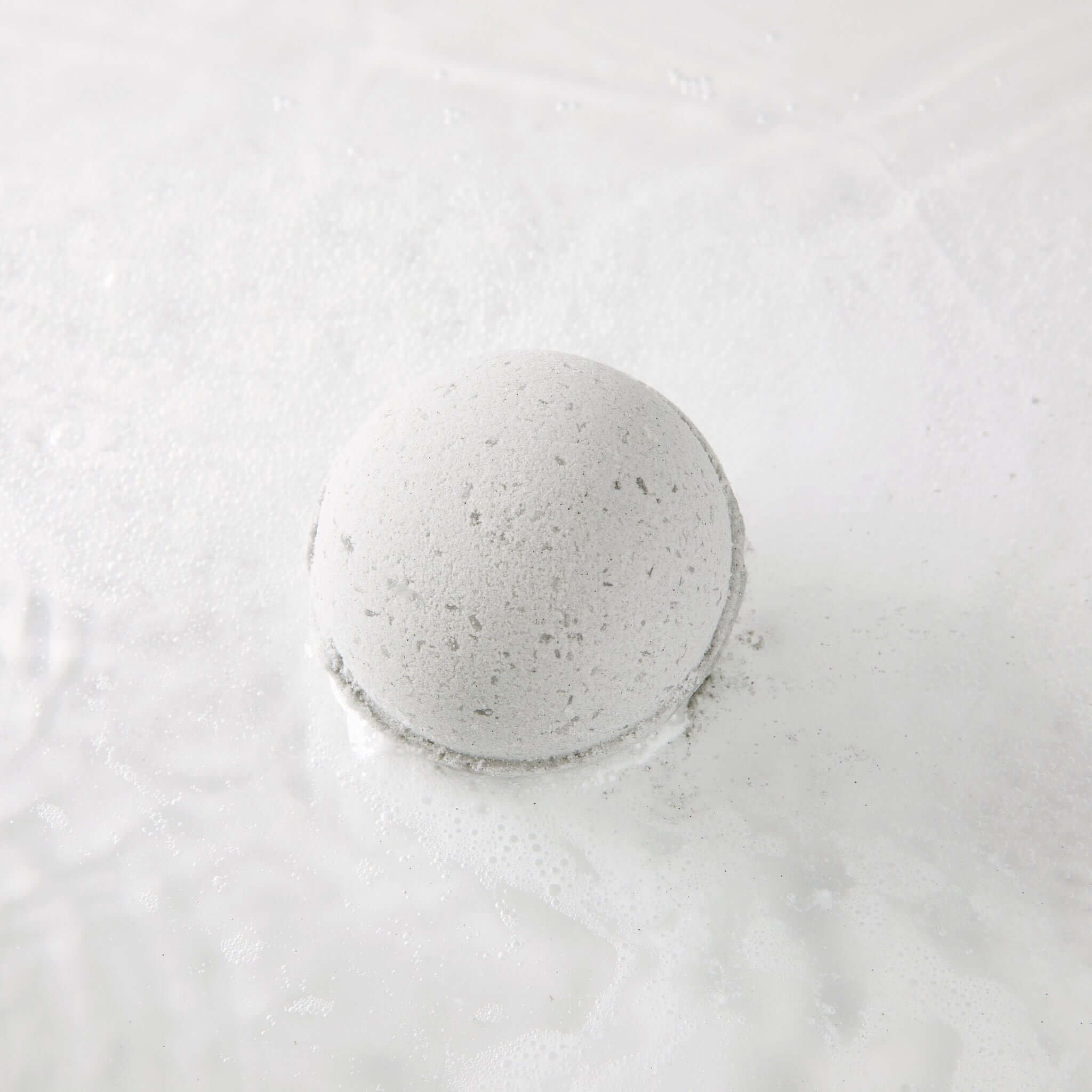 Tub Therapy CBD bath bomb in Jasmine and Charcoal scent with 100mg full-spectrum CBD