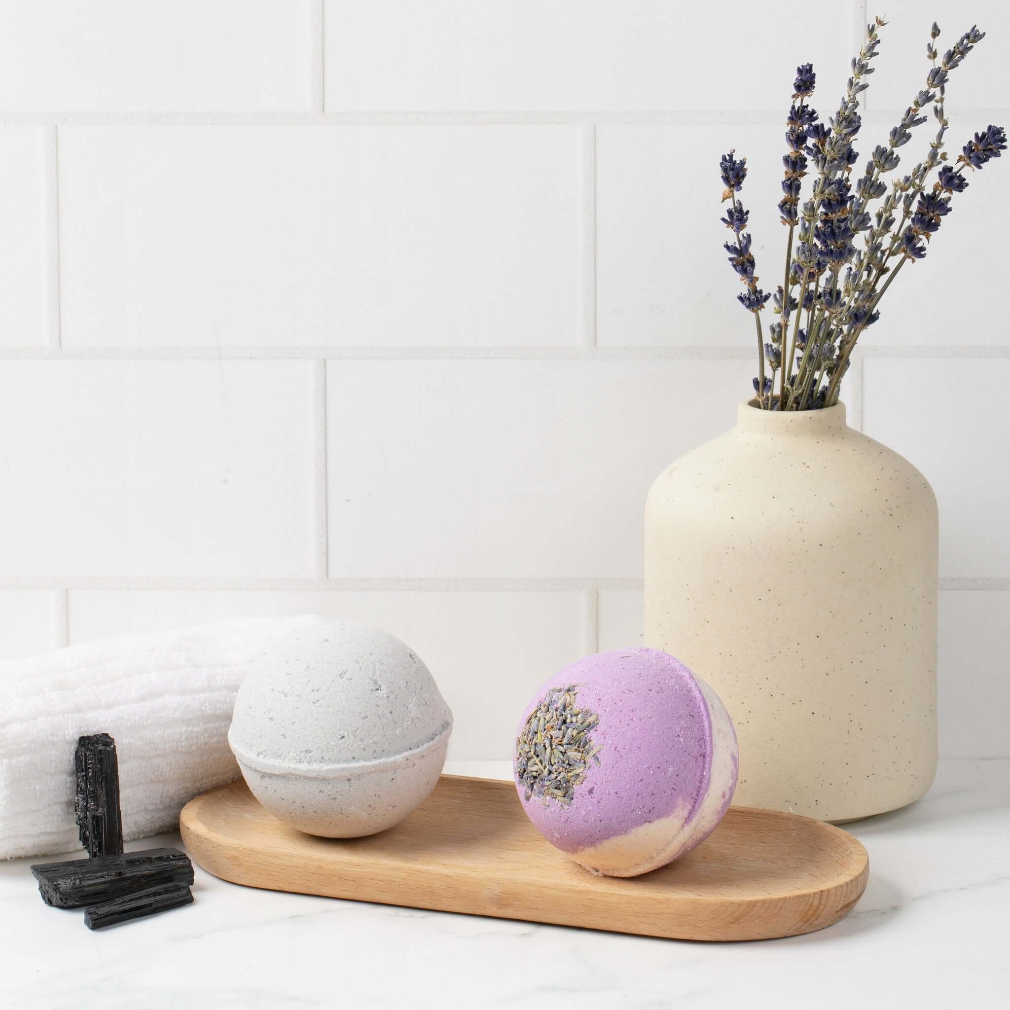 Tub Therapy CBD bath bomb in Lavender French 75 and Jasmine and Charcoal with 100mg full-spectrum CBD